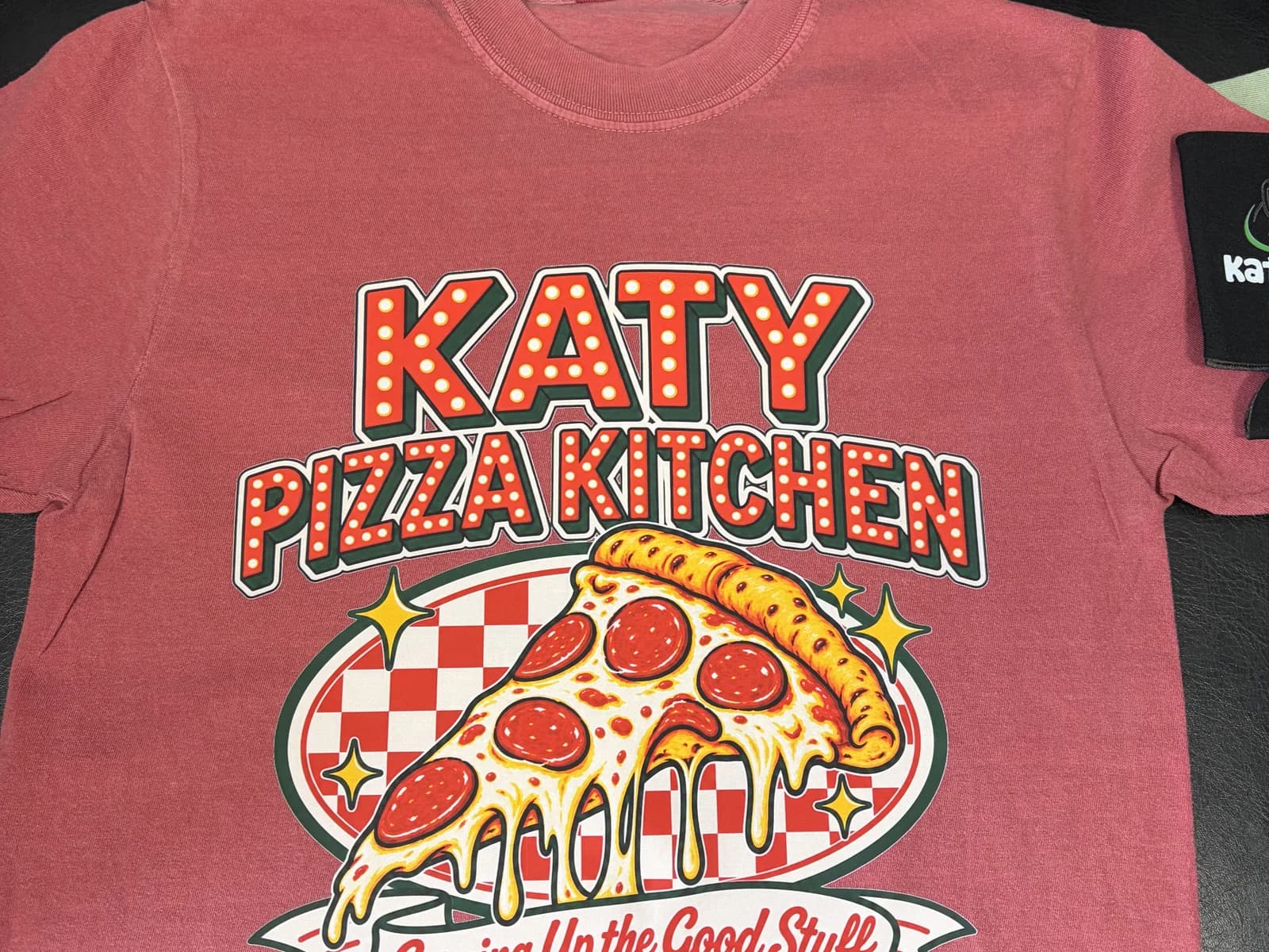 Custom Katy Pizza Kitchen t-shirt with a colorful printed design